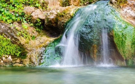 View of hot springs with waterfall